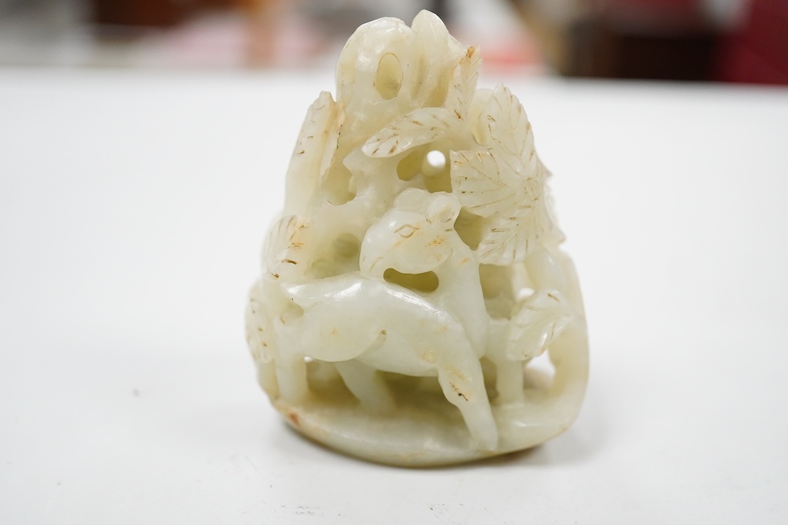 A Chinese pale celadon jade 'deer' pebble carving, 7cm high